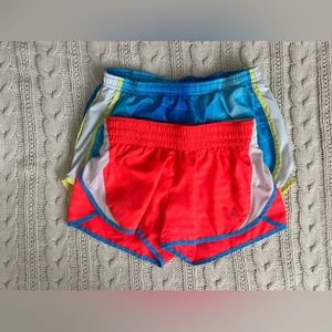 Set of 2 Nike dri fit running shorts with built-in liners, size xs